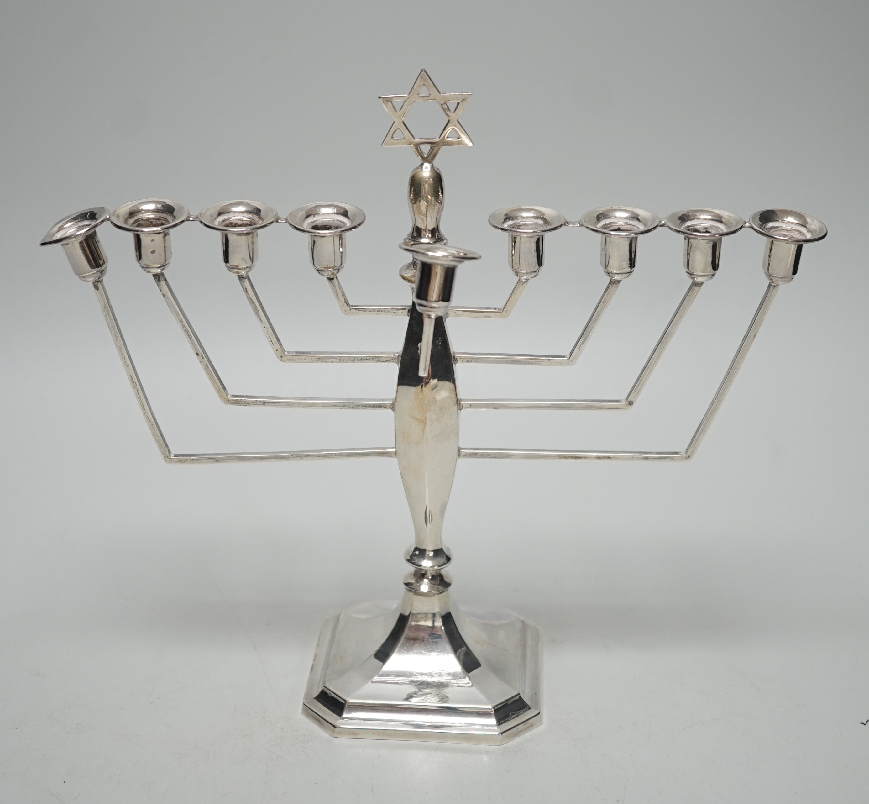 A George V silver Hanukah Menorah, Britton, Gould & Co, Birmingham, 1937, height 23.cm, 7.7oz.